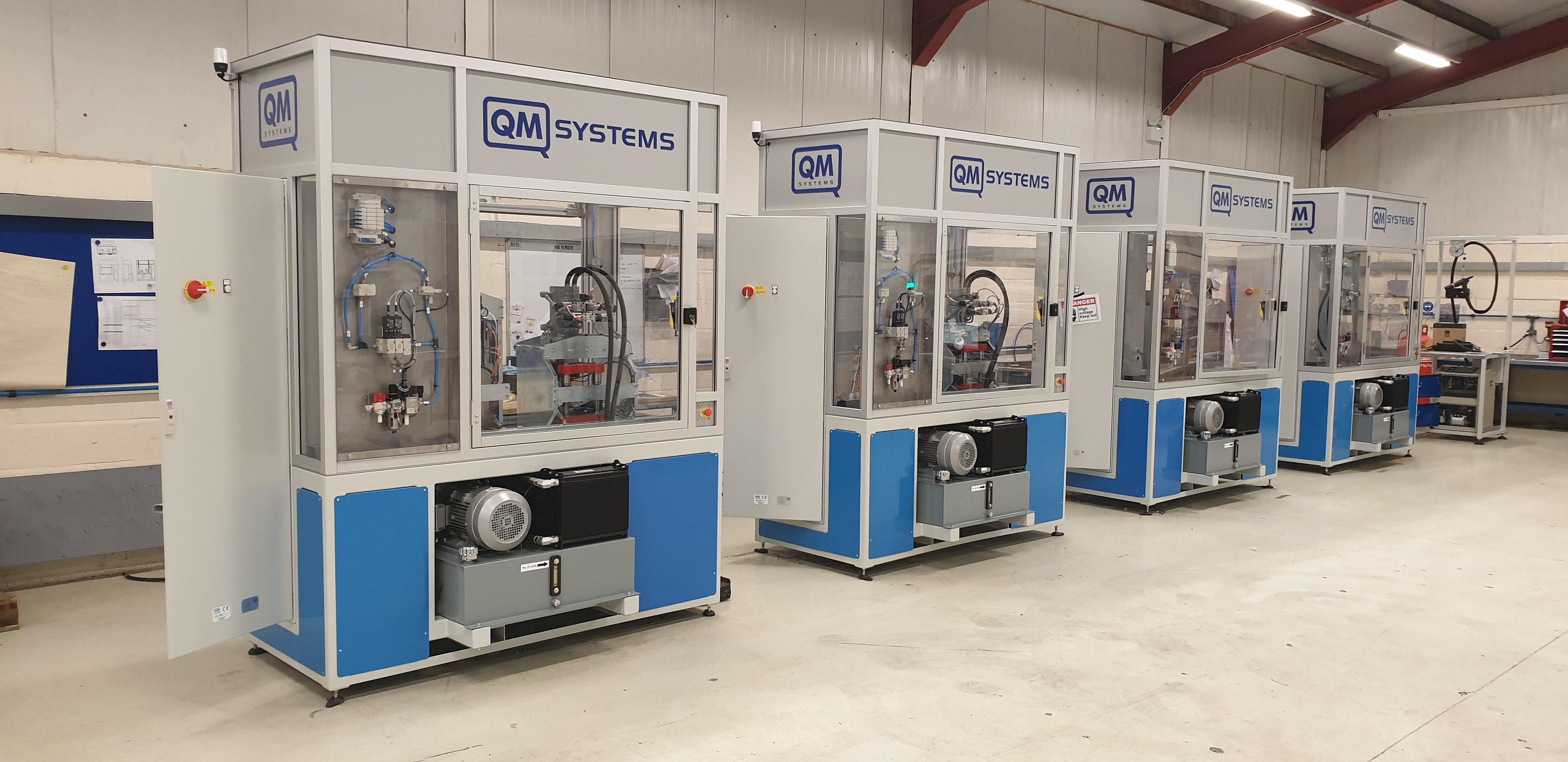 QM Systems Spacnut presses